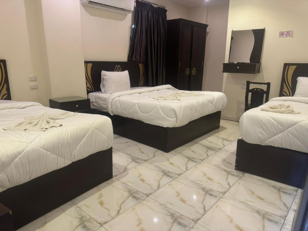 City Pyramids Inn Kafret el-Gabal Extérieur photo