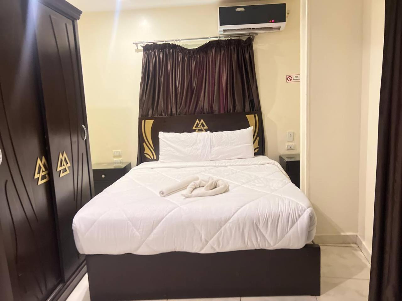 City Pyramids Inn Kafret el-Gabal Extérieur photo