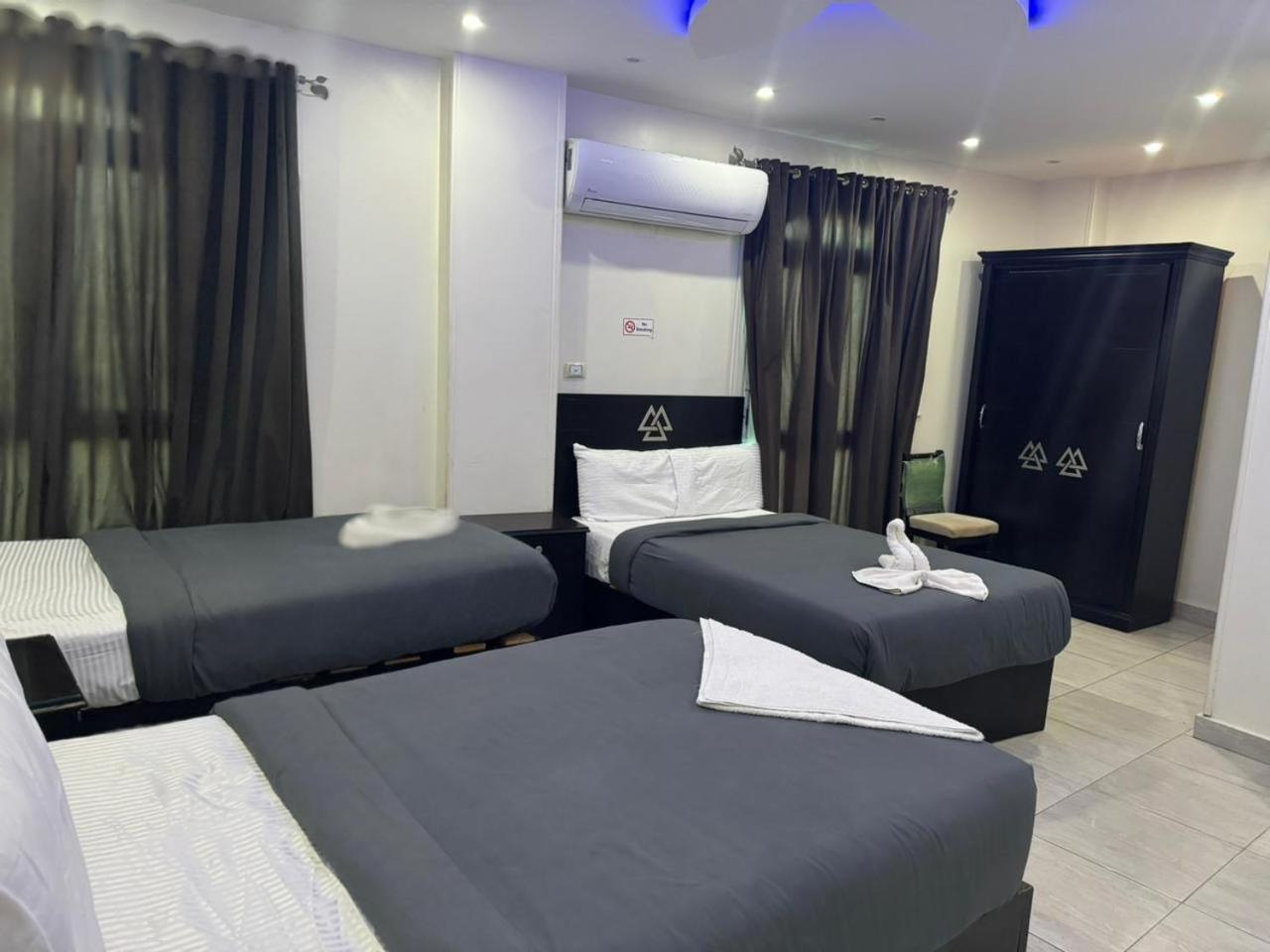 City Pyramids Inn Kafret el-Gabal Extérieur photo