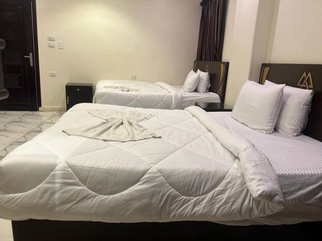 City Pyramids Inn Kafret el-Gabal Extérieur photo